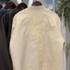 پردیس کت چرم جیب گلدوزی زرافه